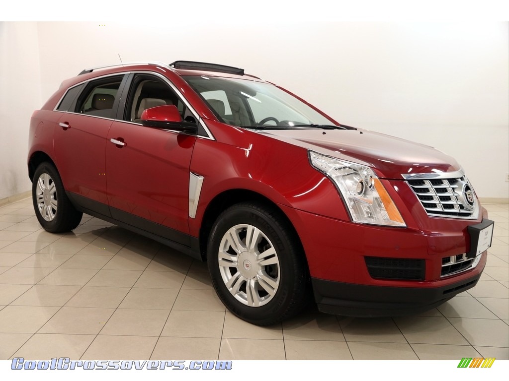 Crystal Red Tintcoat / Shale/Brownstone Cadillac SRX Luxury FWD