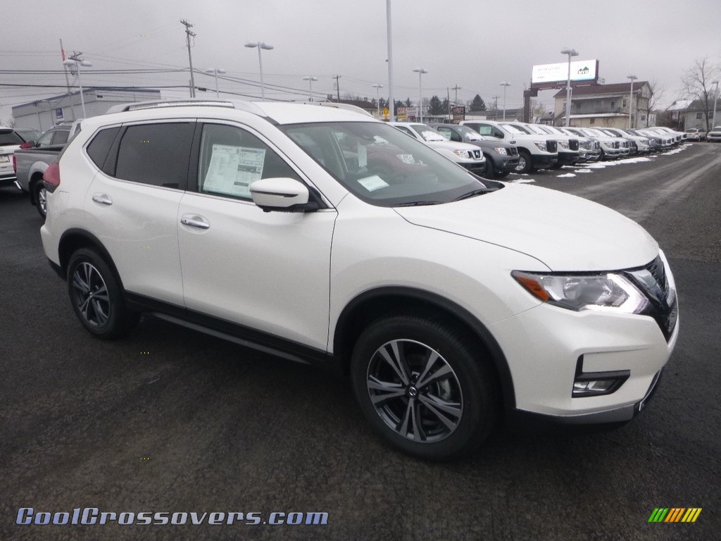 Pearl White / Charcoal Nissan Rogue SV AWD