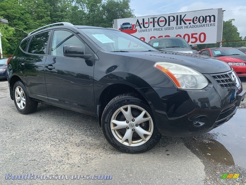 Wicked Black / Gray Nissan Rogue S AWD