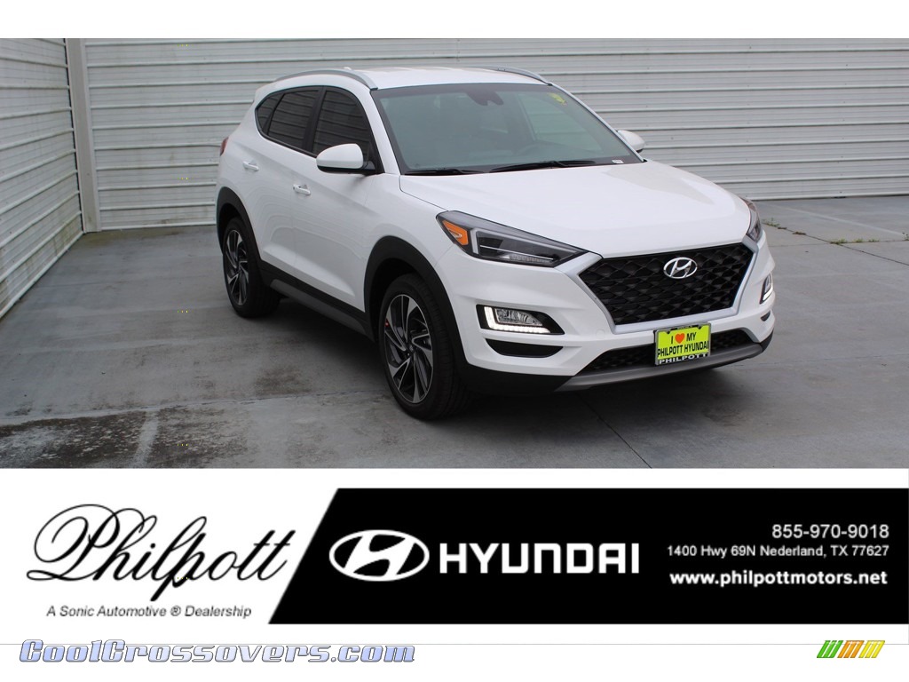 Winter White / Beige Hyundai Tucson Sport