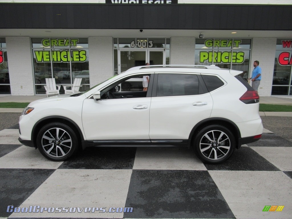Pearl White / Charcoal Nissan Rogue SL